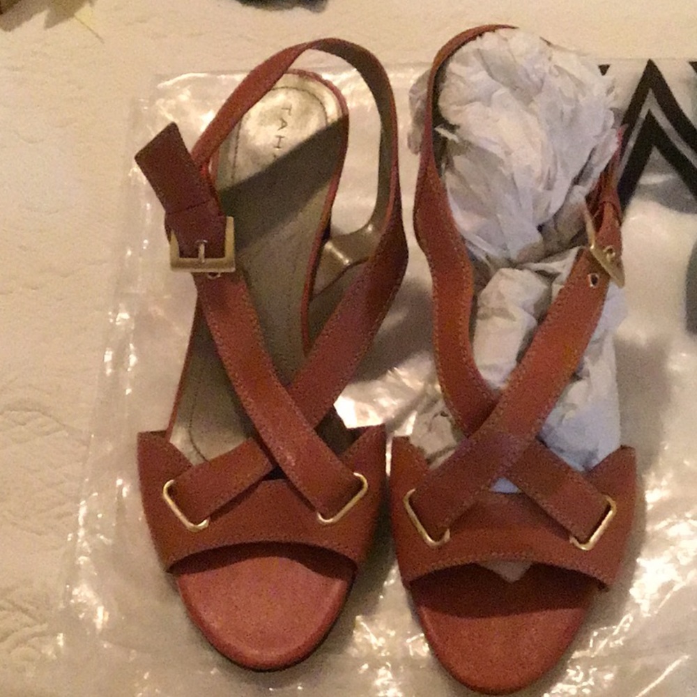Orange brown Tahari sandals.